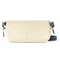 Zdjęcie do “Skinarma Crossbody Fardel kość słoniowa - torba”.